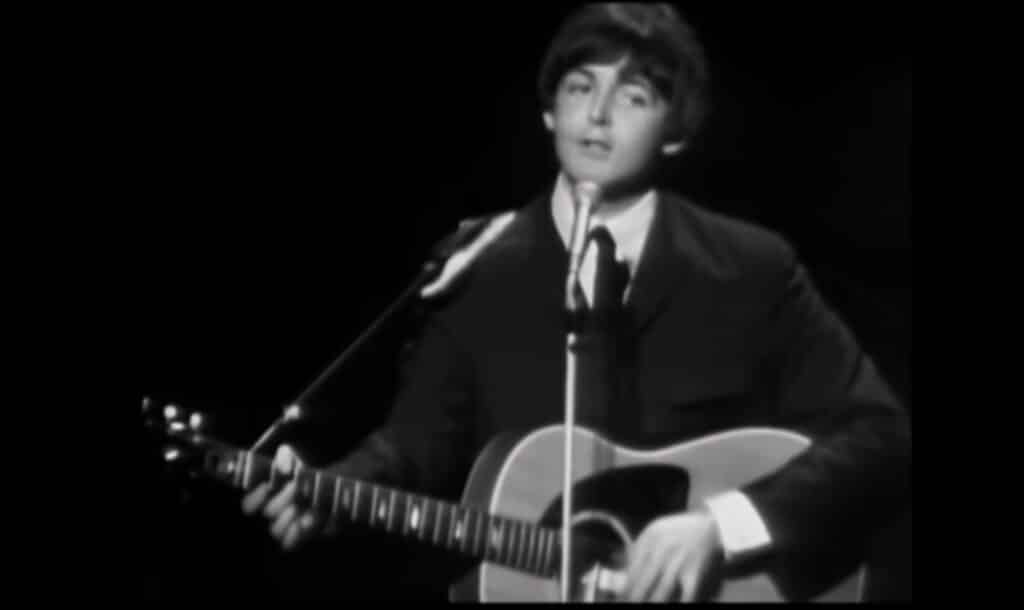 Paul McCartney performing yesterday in the 60s
